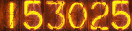 153025
